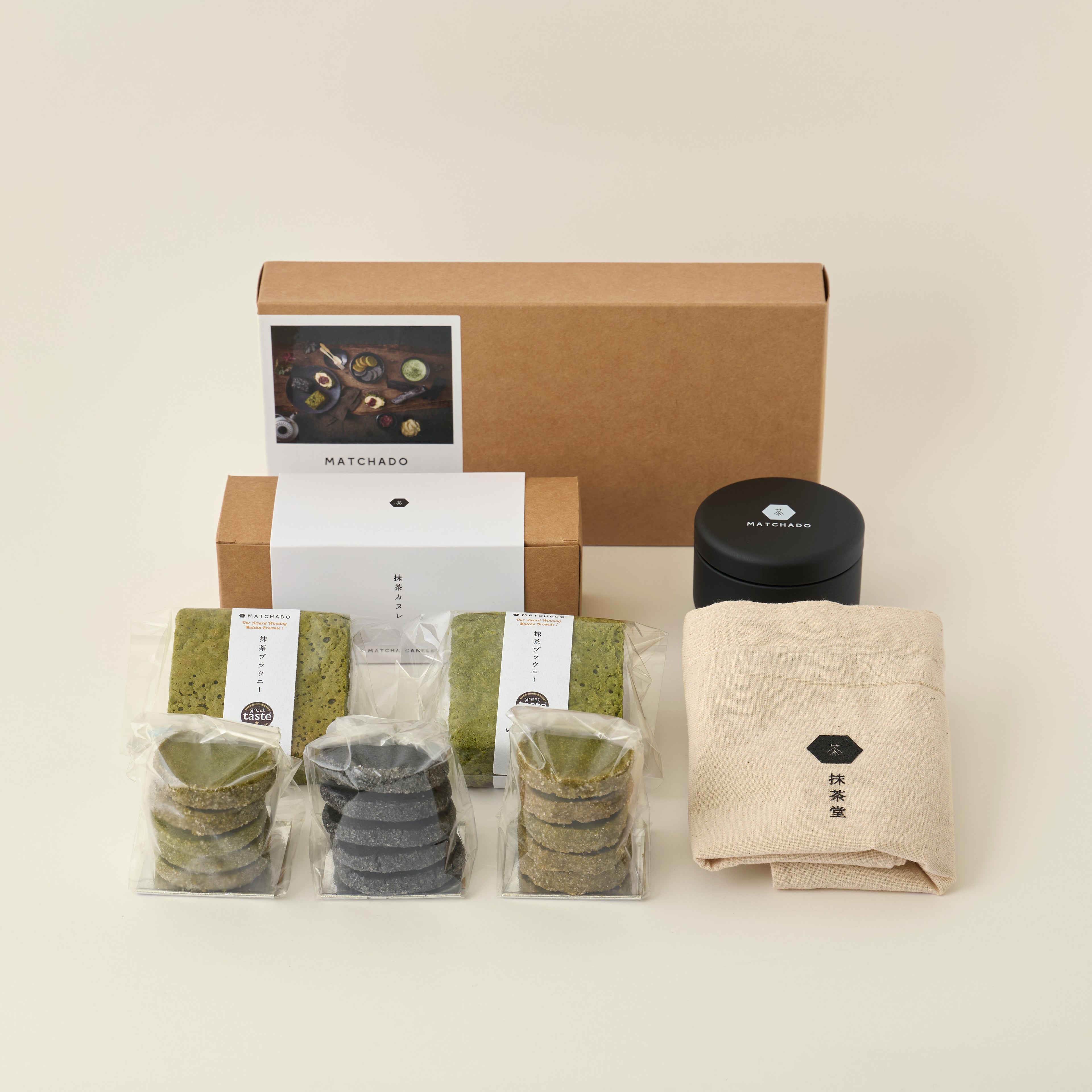 MATCHADO Afternoon tea set. Tea packaging set including matcha green tea products on a beige background
