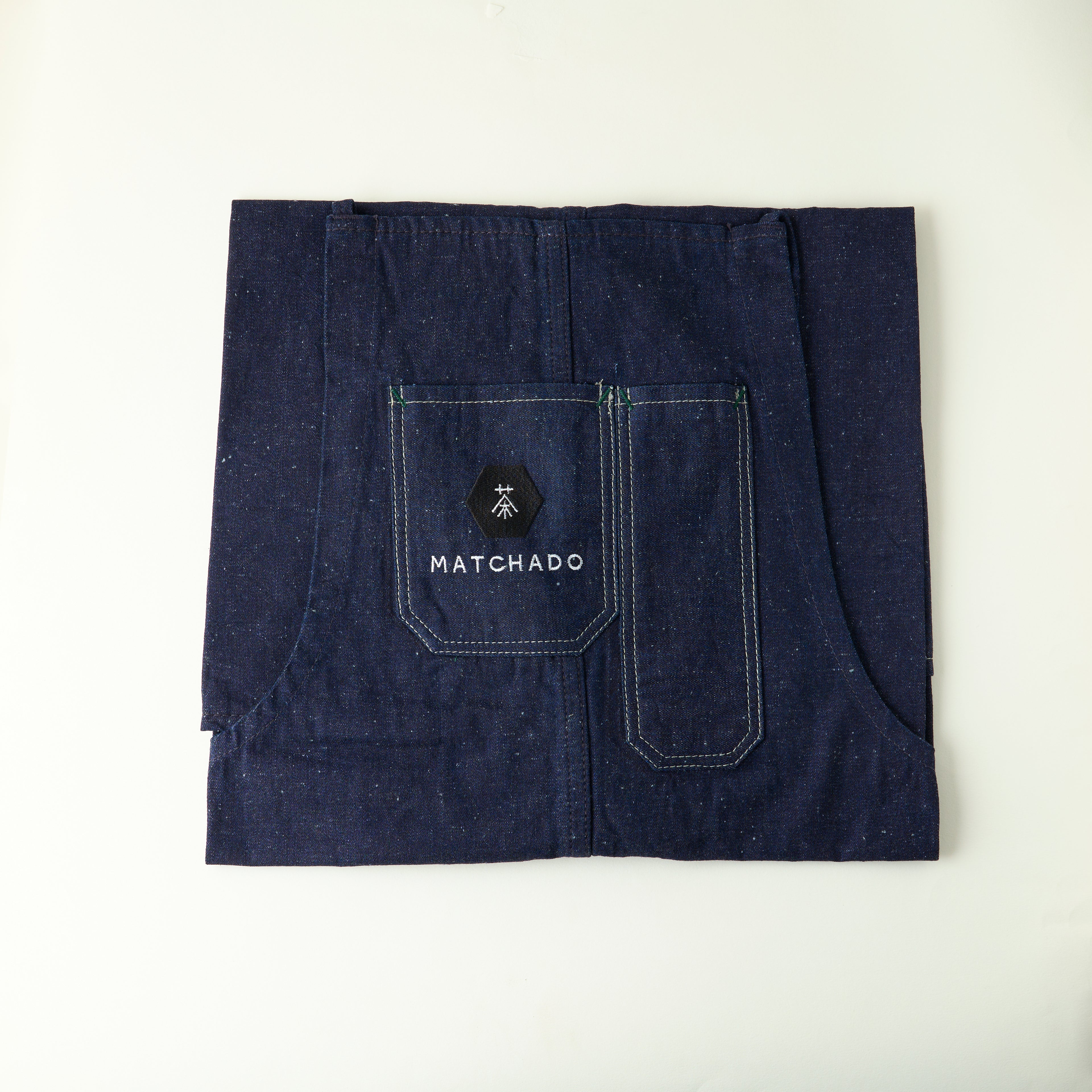 MATCHADO Japanese Denim Apron - Handmade in Okayama - Durable & Timeless Fade. Folded denim fabric with &