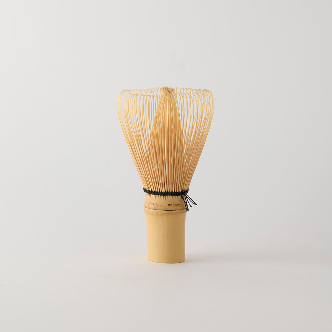 MATCHADO 80-prong Takayama Bamboo Whisk | Hand Made in JAPAN. Bamboo whisk on a light gray background