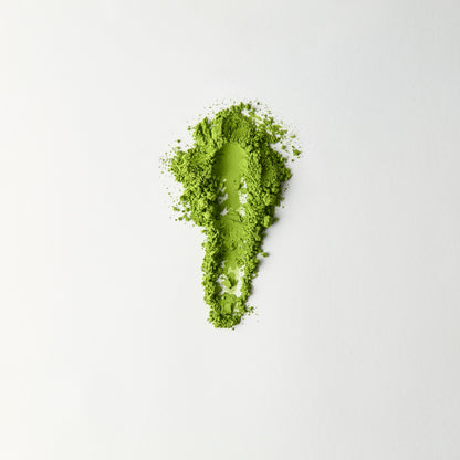 MATCHADO Kyoto Saemidori Unsweetened Matcha (NEW) - Single Origin - Bright Green &amp; Delicate Floral Notes. Matcha powder shaped like a footprint on a white background