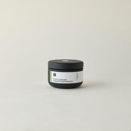 MATCHADO Kyoto Ujihikari Unsweetened Matcha (NEW) - Single Origin - Creamy &amp; Subtly Savoury Flavor. Jar of unsweetened matcha on a light gray background