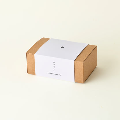 Kraft paper box with a white label on a beige background