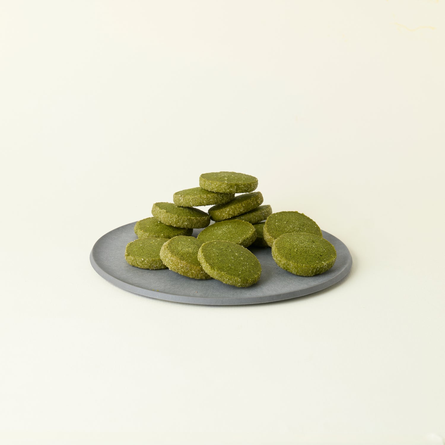 MATCHADO Handcrafted Japanese Shortbread Biscuits on a gray plate with a white background