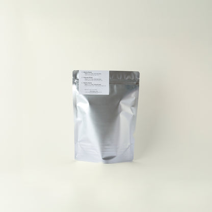 MATCHADO silver foil packaging with a label on a white background
