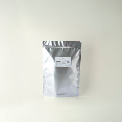 MATCHADO Sweetened Matcha For Latte (Wholesale). Silver foil packaging with a label on a white background. 1kg