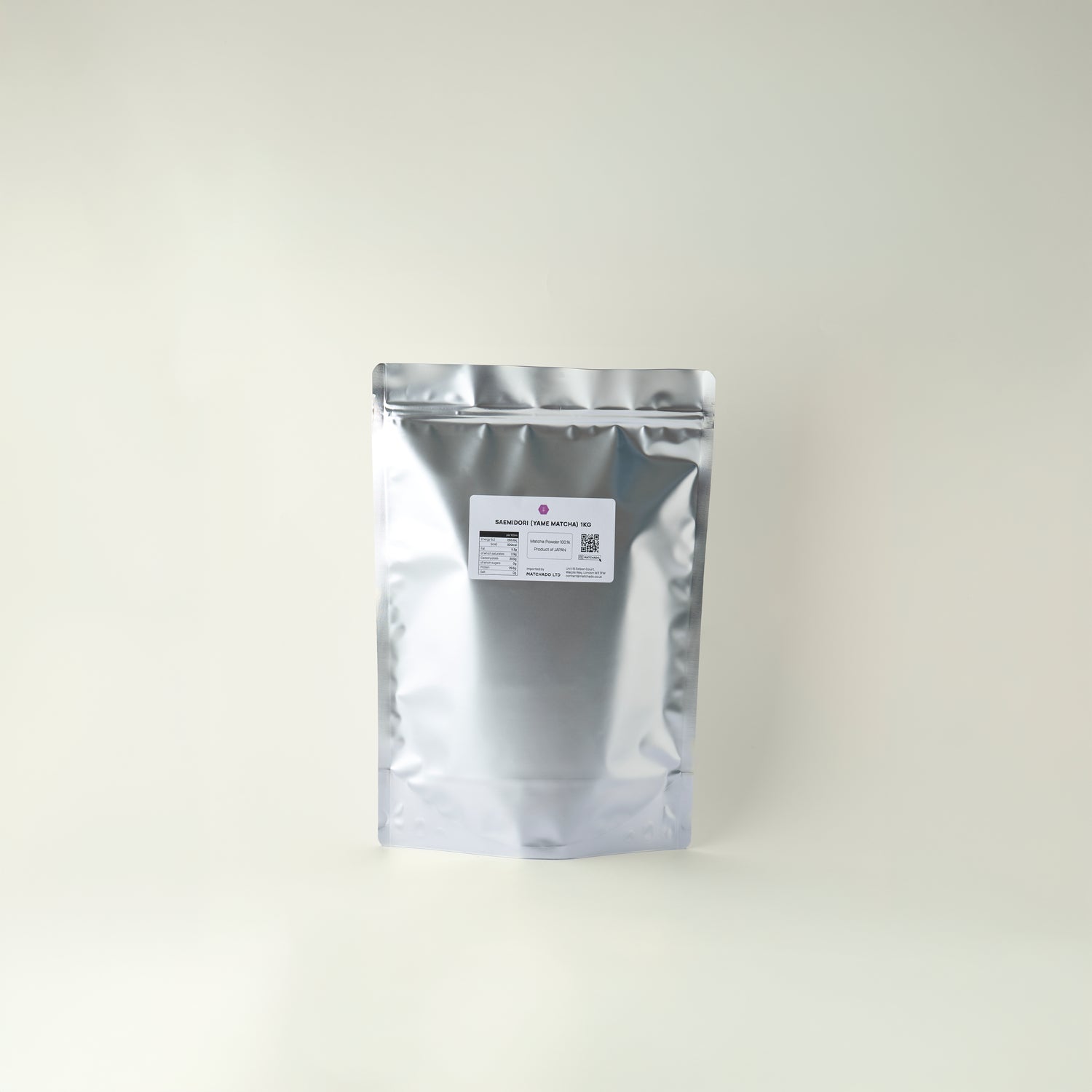 Silver foil packaging with a label on a white background