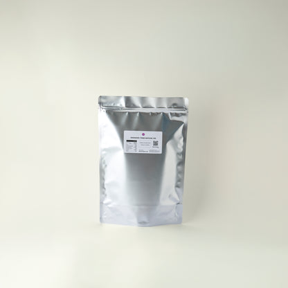 Silver foil packaging with a label on a white background