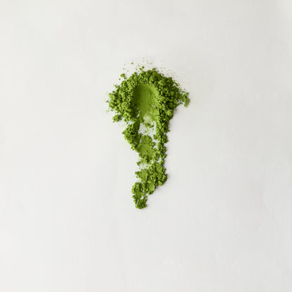 MATCHADO Organic Saemidori Matcha Premium First Flush Single Origin. Green powder in the shape of a leaf on a white background